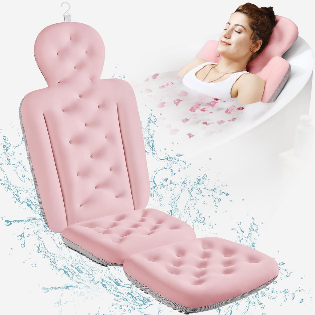 Pink inflatable bathtub seat with a woman relaxing on it, surrounded by water droplets.
